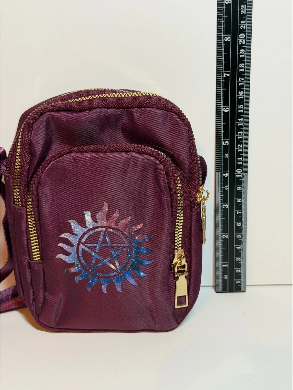 Maroon small crossbody bag with anti possession symbol from Supernatural. New